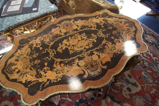 A French ormolu mounted marquetry and kingwood centre table, W.4ft 2in. D.2ft 6in. H.2ft 6in.